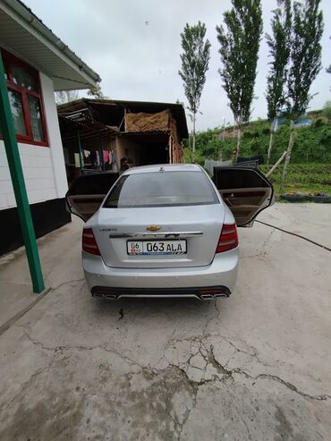 фара опель вектра б: Серебристый седан Chevrolet Lacetti с открытыми дверями