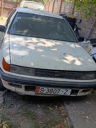 daf 2013: Mitsubishi Lancer: 1990 г., Седан — 1