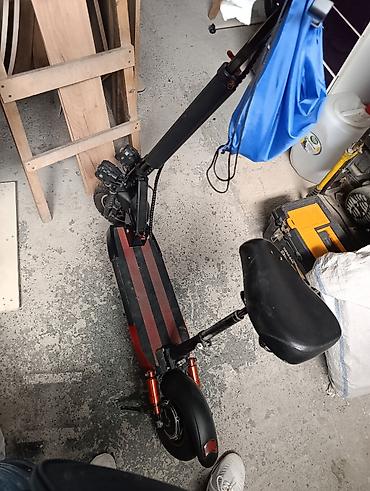Электротранспорт: Elektrik skuter – oturacaqlı, güclü və rahat Xüsusiyyətlər: - İkili — 1