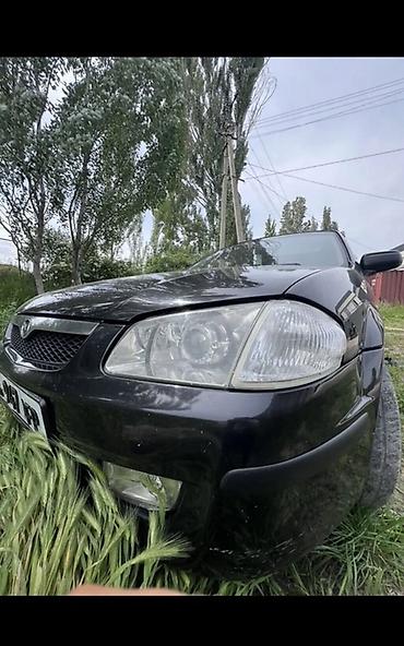 Mazda: Mazda 323: 1999 г., 1.5 л, Механика, Бензин, Универсал — 5