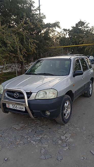 subaru wilderness: Mazda Tribute: 2003 г., 2 л, Механика, Бензин, Кроссовер — 4