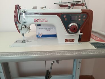 Промышленные швейные машинки: Промышленная швейная машина Dülüpü Machine (модель на корпусе