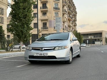 фольксваген 1: Honda Civic: 1.3 l | 2007 il Sedan