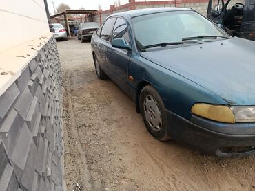 на опель вектра а: Mazda 626: 1992 г., 2 л, Механика, Бензин, Седан