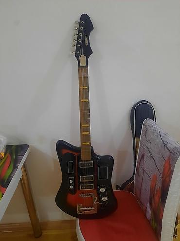 Гитары: Elektrik gitara – vintaj üslubda, “TONIKA” loqolu başlıq — 1
