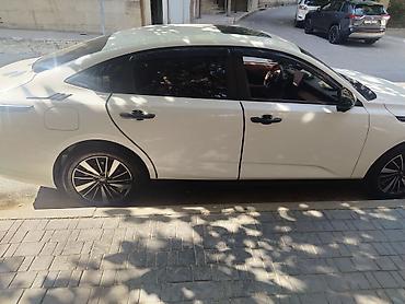 ucuz elektrikli avtomobil: Changan Qiyuan A05: 1.5 l | 2025 il 35 km Sedan — 5