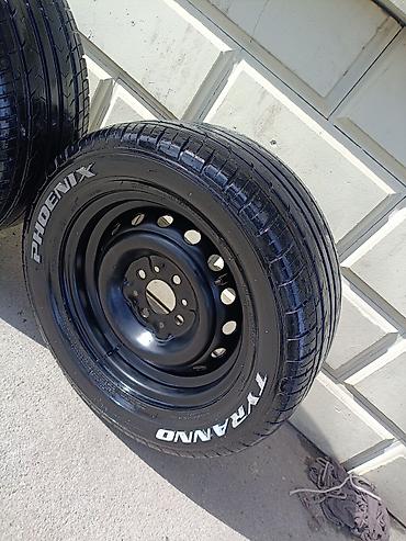 Təkərlər: Şin Roadstone 215 / 50 / R 13 — 5