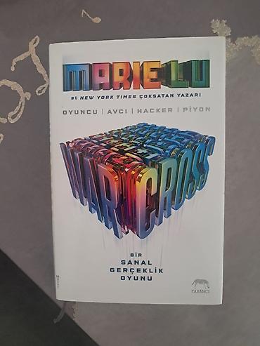 oyun kaseti: Məhsul: Kitab – “Warcross” (Marie Lu) Dil: Türkcə nəşr Nəşriyyat — 1