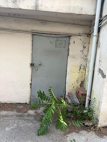 güven emlak: İki ədəd qaraj qapisi
1 ədəd dəmir anbar qapisi
1 ədəd bak[su çəni] — 3