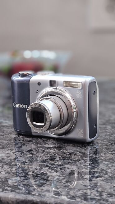 Фотоаппараты: Цифровой фотоаппарат canon zoom 4X, сейчас современные телефоны до сих