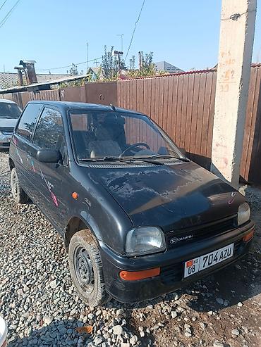 mersedes 212: Daihatsu Cuore: 1994 г., Механика, Бензин, Хэтчбэк — 1