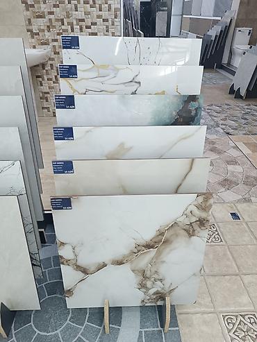 hamam kafeli: Mərmər effektli keramoqranit və divar-döşəmə plitələri. 60x60 ölçüdə — 1