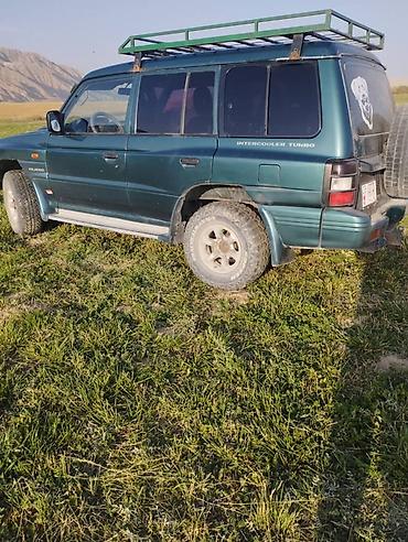 салон машины: Mitsubishi Pajero: 2003 г., 2.5 л, Механика, Дизель, Внедорожник — 1
