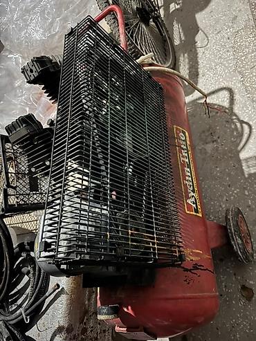 sessiz kompressor: Aydın-Trafo markasına məxsus qırmızı rəngdə kompressor. Balon tipli — 3