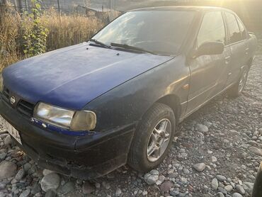 пример про: Nissan Primera: 1995 г., 1.6 л, Механика, Бензин, Седан