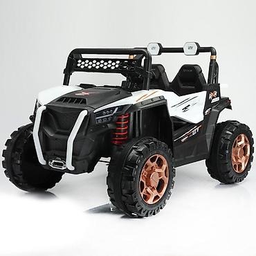 cizme moja: UTV za decu 2217 – 12V, bela varijanta, 4×4 pogon Opis: Električni — 1