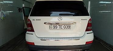 Mercedes-Benz: Mercedes-Benz ML sinfi SUV Xüsusiyyətlər: - Kuzov: ağ rəng, 5 qapılı — 12