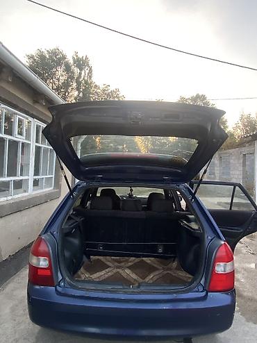 kia geed: Mazda 323: 2001 г., Хэтчбэк — 5