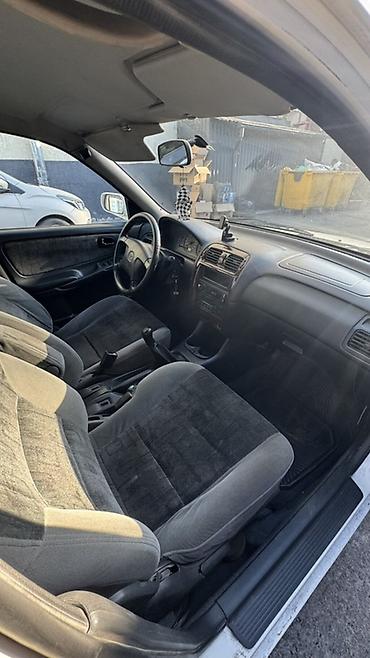 мото зонтик: Mazda Capella: 1999 г., Универсал — 6