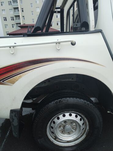 Mitsubishi: Mitsubishi pikap – ikiqat kabinəli, arxa açıq yük bölməsi və — 5