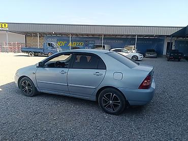 рул: Toyota Corolla: 2005 г., 1.6 л, Кол менен иштөөчү, Бензин, Седан — 5
