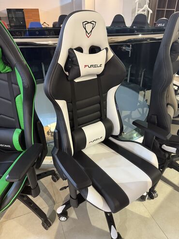 Ofis və oyun kresloları: Təkərli, Qolları tənzimlənir, Süni dəri — 24