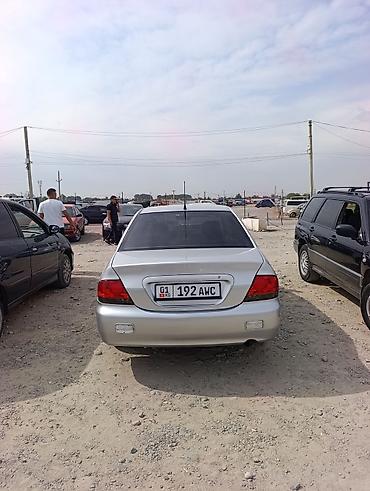 mitsubishi karisma: Mitsubishi Lancer: 2002 г., 1.6 л, Автомат, Газ, Седан — 4