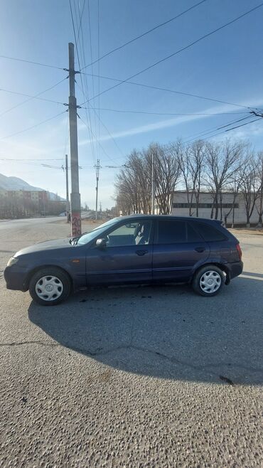 Mazda: Mazda 323: 2003 г., 1.6 л, Механика, Бензин, Хэтчбэк