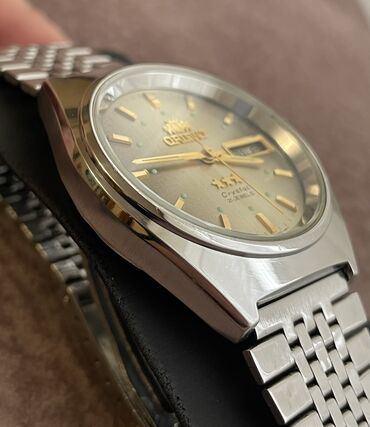 Qol saatları: İşlənmiş, Qol saatı, Orient, rəng - Qızılı — 4