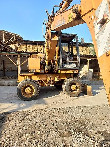 Экскаваторы: Экскаватор, Case, 1997 г., Колесный — 9