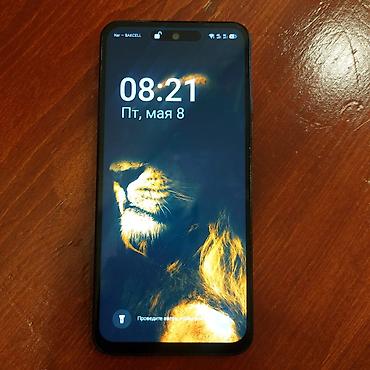 nar paketler: Smartfon – böyük ekranlı, ön hissədə mərkəzləşmiş “notch” kəsiyi və — 1