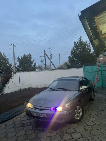 Mazda: Mazda 626: 1994 г., Хэтчбэк — 14