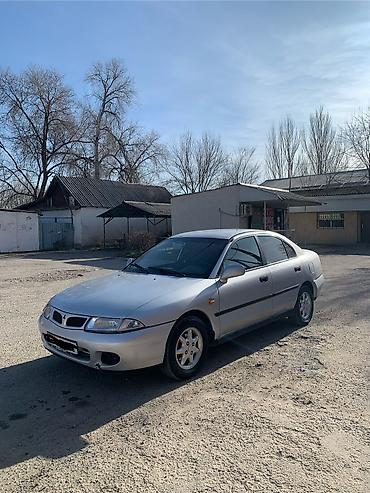 срочное: Mitsubishi Carisma: 1999 г., 1.8 л, Механика, Бензин, Седан — 10