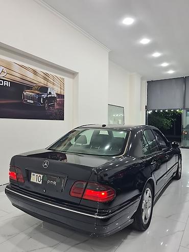 audi 6: Mercedes-Benz E-Class: 2.6 l | 2001 il Sedan — 6