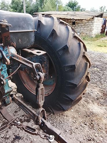 tufan m50 haqqinda: Sovet istehsalı təkərli traktor, arxa 3 nöqtəli asqı və PTO çıxışı — 2