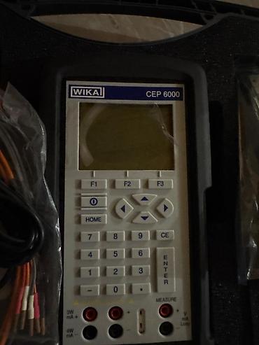 mata pila: WIKA CEP 6000 proses kalibratorı və Sufvan TP60 kabel/etiket yazıcısı — 1