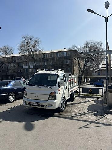 kiya bongo: Hyundai Porter II (бортовой малотоннажный грузовик) - Компактный — 2