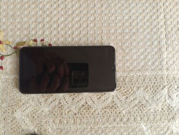 Apple iPhone: Samsung Galaxy A10, 32 GB, rəng - Göy, Düyməli, Sensor, İki sim kartlı
