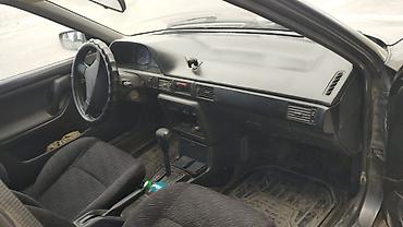 Транспорт: Mazda 323: 1990 г., Седан — 6