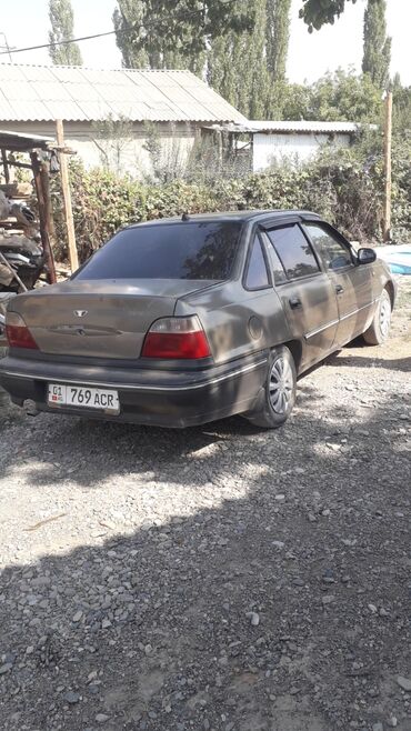 киа оптима бампер передний нижний пластмас: Автомобиль Daewoo Nexia в кузове седан, выполненный в темно-сером