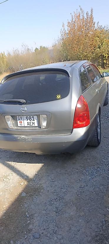 посадка авто: Nissan Primera: 2002 г., Универсал — 2
