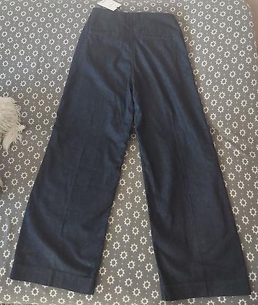 yassa jakne: MANGO ženske pantalone od tamnog denima, širokog kroja.Velicina M - — 4