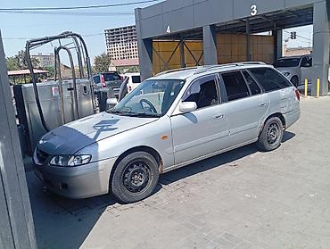 capella: Mazda Capella: 2002 г., 1.8 л, Автомат, Бензин, Универсал — 6