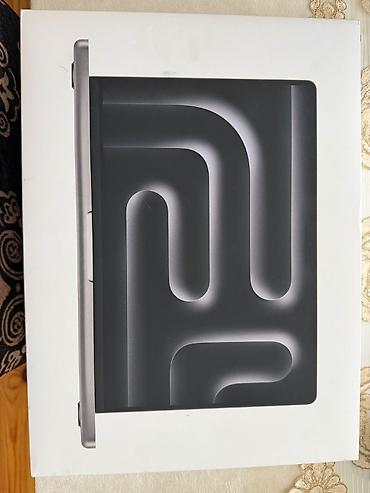 macbook pro m3: MacBook Pro m3 yenikidi 5 defe kinoya baxilib ustunde orginal adapdir — 4