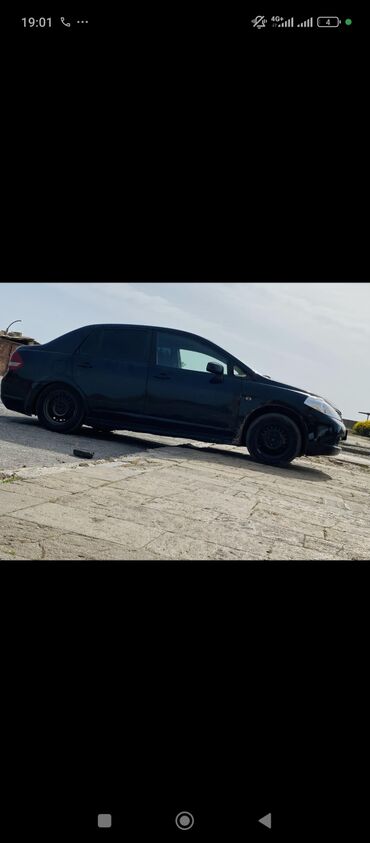 Nissan: Nissan Tiida sedan, qara rəng. - Ban növü: 4 qapılı sedan - Rəng — 11