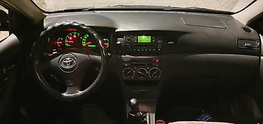 с4 2: Toyota Corolla: 2003 г., Механика, Дизель, Универсал — 7