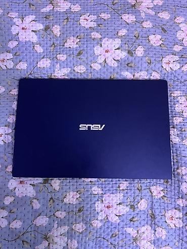 Ноутбук ASUS (серия VivoBook/15") в синем цвете. Ключевые