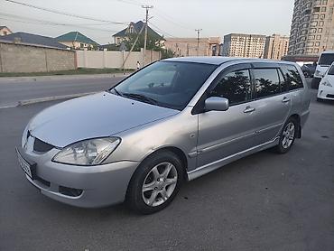 катафота: Mitsubishi Lancer: 2005 г., 1.6 л, Механика, Бензин, Универсал — 1