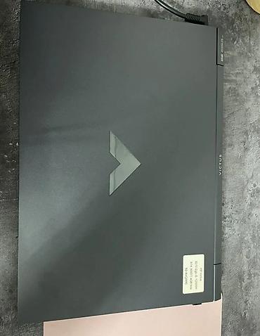 Ноутбуки HP: Игровой ноутбук HP Victus в строгом тёмно-сером корпусе. Подходит для — 4