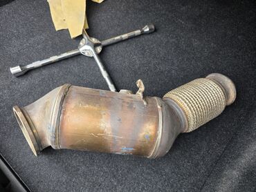 срочно в связи с переездом: Продаю катализатор на BMW g30 год 2018 пробег авто был 140 тысяч